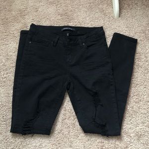 Black ripped skinny jeans